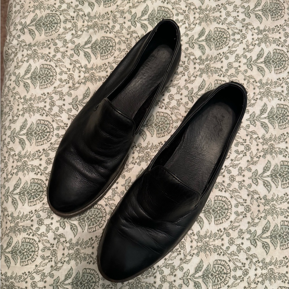 Black leather loafers
